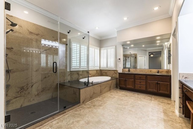 8205 Taos Paseo Ave, Las Vegas, NV 89128 - bathroom with double vanity, a bath, ornamental molding, a shower stall, and recessed lighting