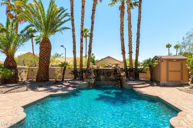 8205 Taos Paseo Ave, Las Vegas, NV 89128 - view of pool with a fenced backyard and a pool with connected hot tub