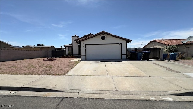 1003 Palo Verde Dr, Henderson, NV 89015 - single story home featuring driveway, a garage, a gate, and a chimney