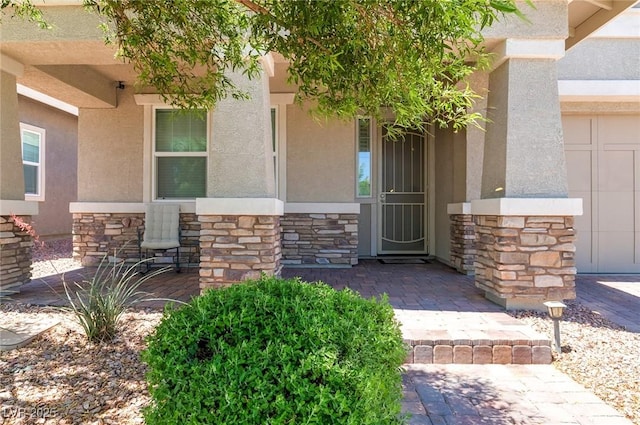 379 Mano Destra Ln, Henderson, NV 89011 - entrance to property featuring stone siding and stucco siding