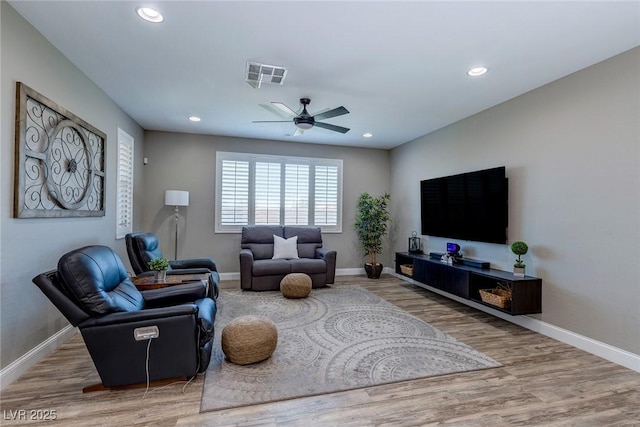 379 Mano Destra Ln, Henderson, NV 89011 - living room featuring a ceiling fan, baseboards, wood finished floors, and recessed lighting