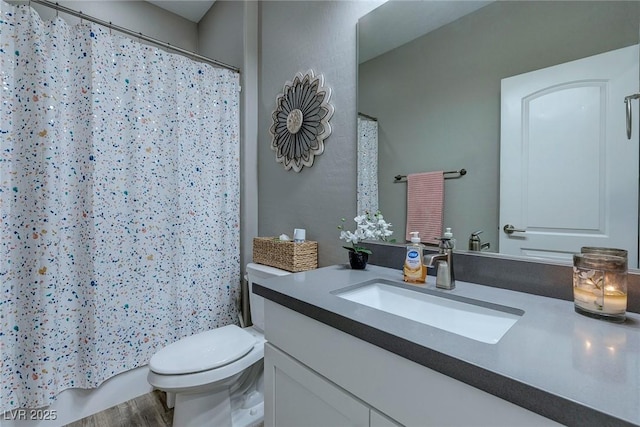 379 Mano Destra Ln, Henderson, NV 89011 - bathroom with vanity, toilet, a shower with curtain, and wood finished floors