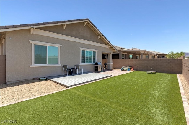 379 Mano Destra Ln, Henderson, NV 89011 - back of property with a patio and stucco siding