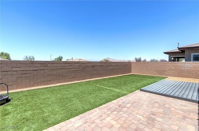 379 Mano Destra Ln, Henderson, NV 89011 - view of yard with a patio