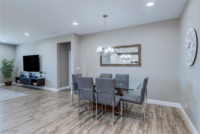 379 Mano Destra Ln, Henderson, NV 89011 - dining room with wood finished floors, baseboards, and recessed lighting
