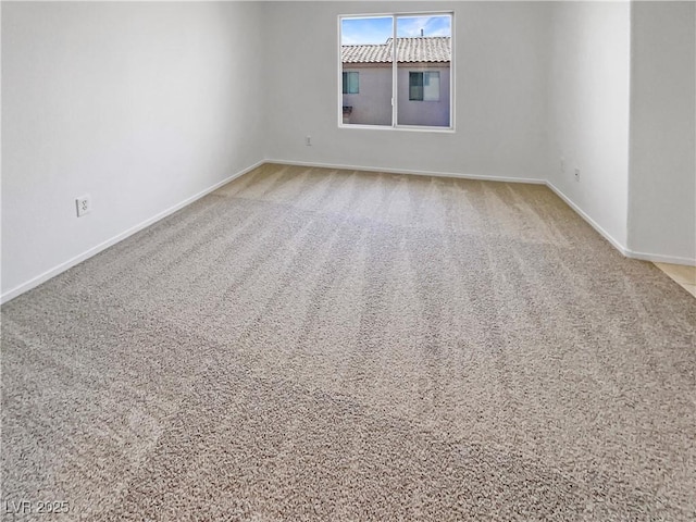 2125 Stone Well Rd, North Las Vegas, NV 89031 - unfurnished room with baseboards and carpet floors