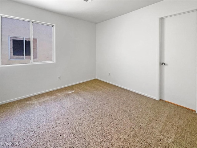 2125 Stone Well Rd, North Las Vegas, NV 89031 - carpeted empty room featuring baseboards