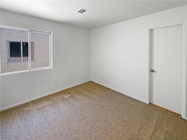 2125 Stone Well Rd, North Las Vegas, NV 89031 - carpeted empty room featuring baseboards