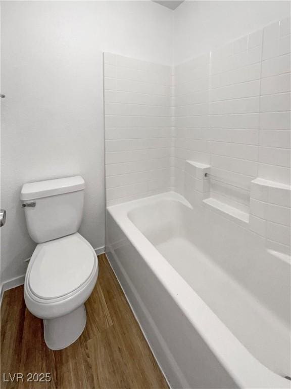 2125 Stone Well Rd, North Las Vegas, NV 89031 - bathroom with wood finished floors, toilet, and baseboards
