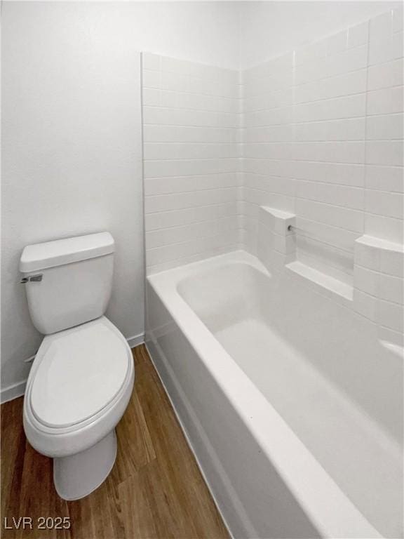 2125 Stone Well Rd, North Las Vegas, NV 89031 - bathroom with wood finished floors, toilet, and baseboards