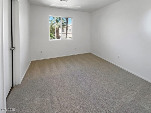 2125 Stone Well Rd, North Las Vegas, NV 89031 - carpeted spare room featuring baseboards