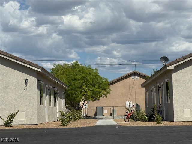 1121 Sixshooter Ave, Pahrump, NV 89048 - view of home's exterior with stucco siding