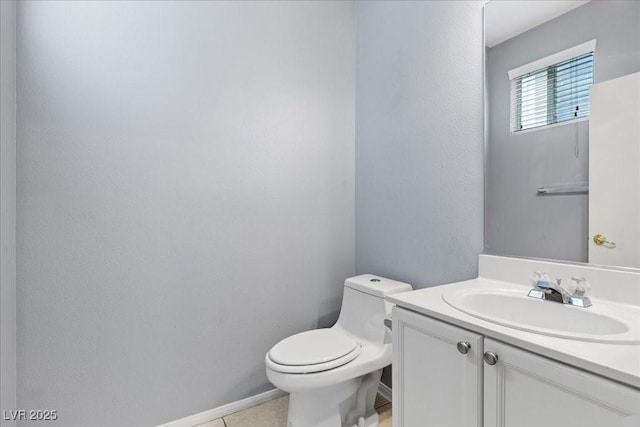 180 Duck Hollow Ave, Las Vegas, NV 89148 - half bathroom with toilet, vanity, baseboards, and tile patterned floors