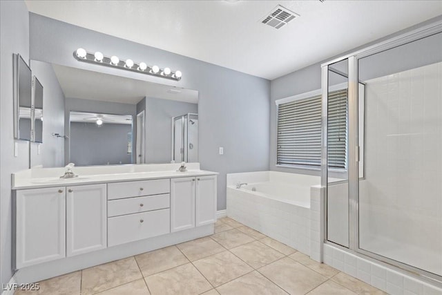 180 Duck Hollow Ave, Las Vegas, NV 89148 - bathroom with double vanity, a bath, a stall shower, tile patterned flooring, and a ceiling fan