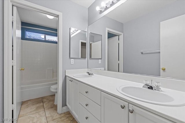 180 Duck Hollow Ave, Las Vegas, NV 89148 - bathroom featuring toilet, double vanity, tub / shower combination, and tile patterned floors