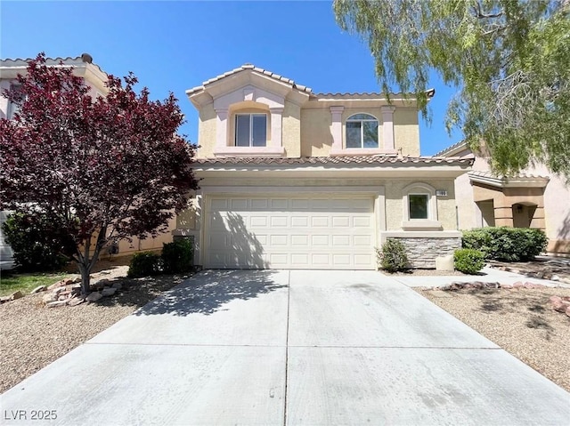 180 Duck Hollow Ave, Las Vegas, NV 89148 - mediterranean / spanish house featuring a tile roof, stucco siding, driveway, and a garage