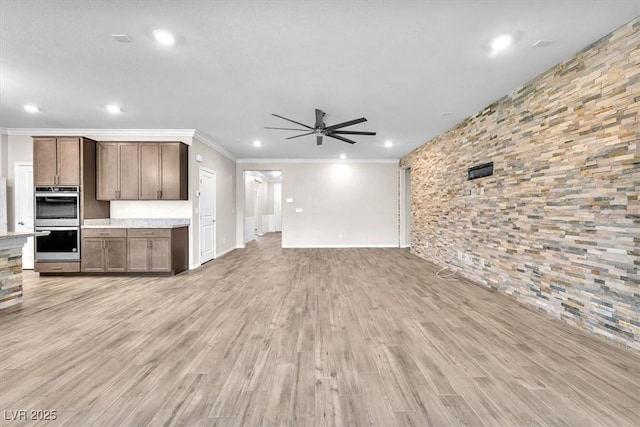 4510 Rubious Ave, North Las Vegas, NV 89084 - unfurnished living room featuring ceiling fan, crown molding, recessed lighting, light wood-style floors, and baseboards