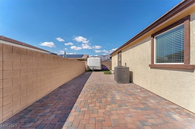 4510 Rubious Ave, North Las Vegas, NV 89084 - fenced backyard featuring a patio area, central AC, and a shed