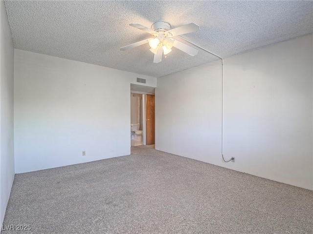 725 N Royal Crest Cir Unit 228, Las Vegas, NV 89169 - carpeted empty room featuring a textured ceiling and a ceiling fan
