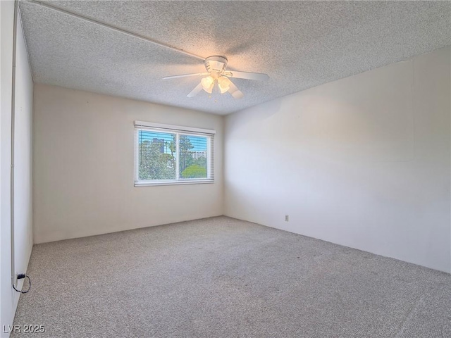 725 N Royal Crest Cir Unit 228, Las Vegas, NV 89169 - empty room with carpet, a ceiling fan, and a textured ceiling