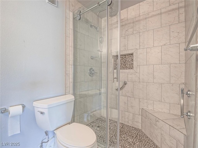 725 N Royal Crest Cir Unit 228, Las Vegas, NV 89169 - bathroom with toilet and a shower stall