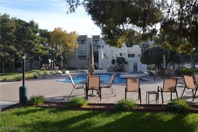 725 N Royal Crest Cir Unit 228, Las Vegas, NV 89169 - community pool featuring a patio