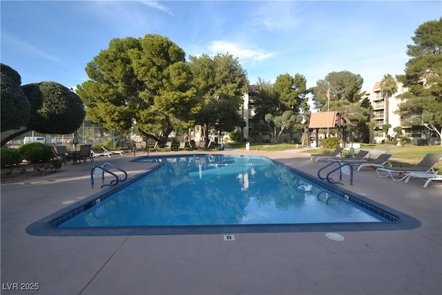 725 N Royal Crest Cir Unit 228, Las Vegas, NV 89169 - community pool with a patio