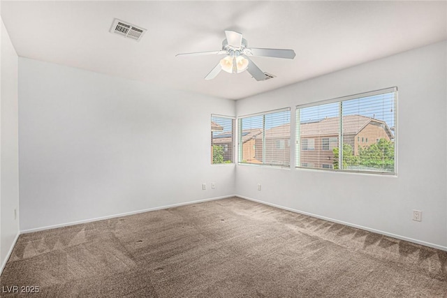9173 Weeping Hollow Ave, Las Vegas, NV 89178 - carpeted spare room with baseboards and ceiling fan