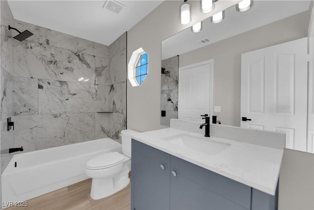 1611 Buffalo Trail Dr, Henderson, NV 89014 - bathroom with vanity, shower / bathtub combination, wood finished floors, and toilet