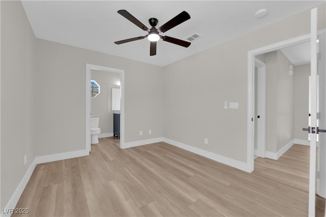 1611 Buffalo Trail Dr, Henderson, NV 89014 - unfurnished room with a ceiling fan, light wood finished floors, baseboards, and a smoke detector