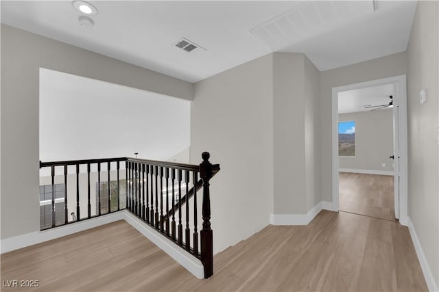 1611 Buffalo Trail Dr, Henderson, NV 89014 - hall featuring an upstairs landing, wood finished floors, and baseboards