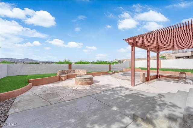 1611 Buffalo Trail Dr, Henderson, NV 89014 - fenced backyard with a fire pit and a patio area