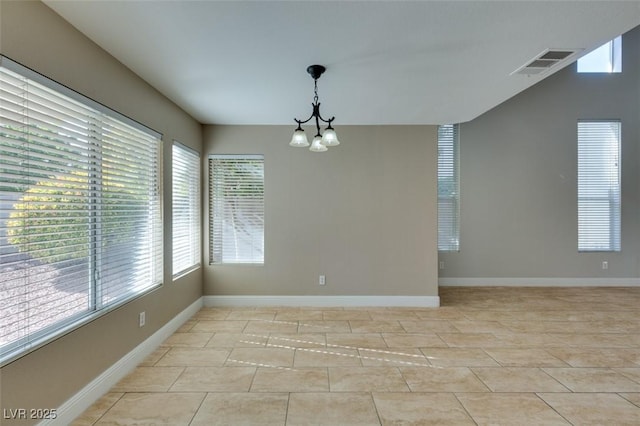 1917 Badger Canyon Ave, North Las Vegas, NV 89031 - empty room featuring a chandelier, baseboards, and light tile patterned floors