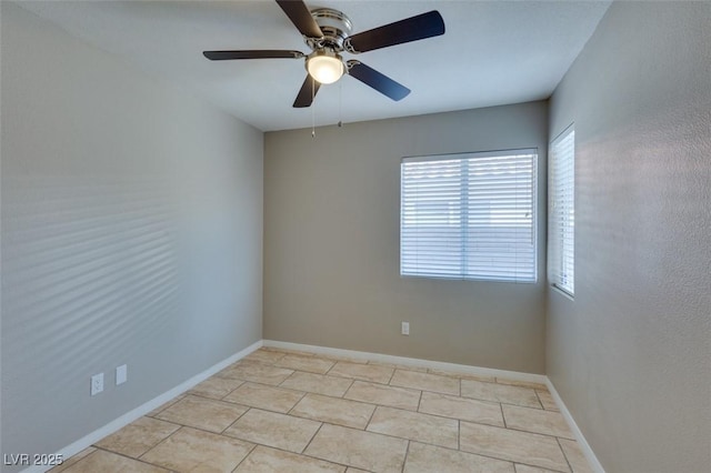 1917 Badger Canyon Ave, North Las Vegas, NV 89031 - unfurnished room with a ceiling fan, baseboards, and light tile patterned floors