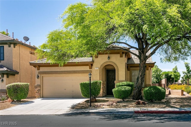 9025 Rusty Rifle Ave, Las Vegas, NV 89143 - mediterranean / spanish house featuring driveway and stucco siding