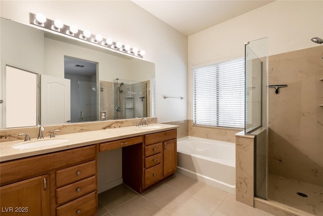 9025 Rusty Rifle Ave, Las Vegas, NV 89143 - full bathroom featuring a stall shower, tile patterned flooring, double vanity, and a garden tub