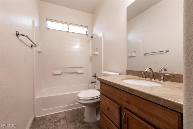 9025 Rusty Rifle Ave, Las Vegas, NV 89143 - full bathroom featuring vanity, toilet, bathtub / shower combination, and stone finish flooring