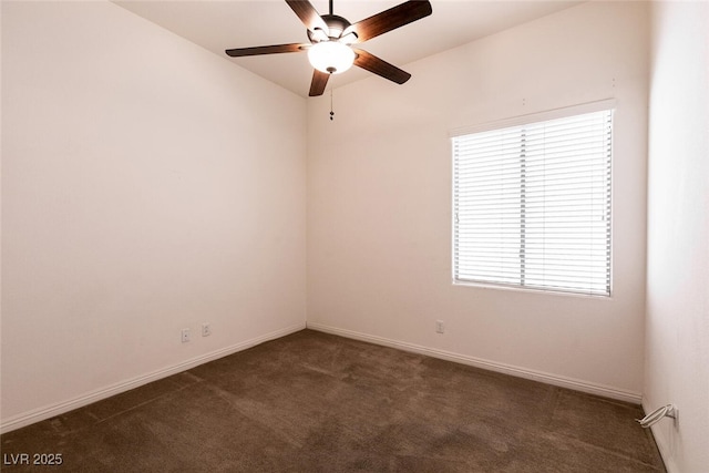 9025 Rusty Rifle Ave, Las Vegas, NV 89143 - empty room with dark carpet, a ceiling fan, plenty of natural light, and baseboards