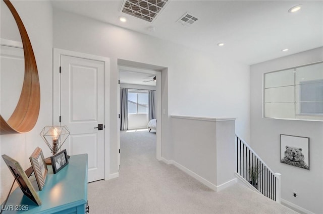 1321 Hudson Creek Pl, North Las Vegas, NV 89084 - hallway with an upstairs landing, light colored carpet, baseboards, and recessed lighting