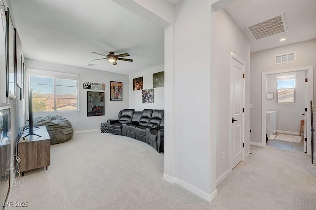 1321 Hudson Creek Pl, North Las Vegas, NV 89084 - living area featuring light carpet, baseboards, a ceiling fan, and recessed lighting