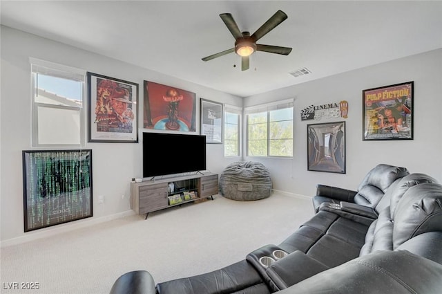 1321 Hudson Creek Pl, North Las Vegas, NV 89084 - carpeted living area with baseboards and ceiling fan