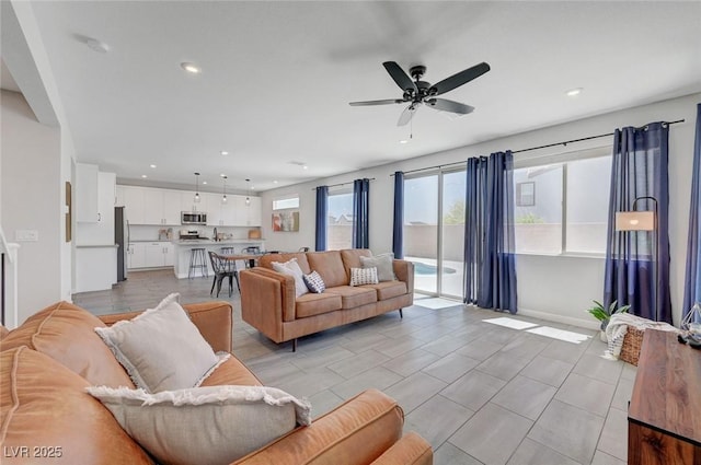 1321 Hudson Creek Pl, North Las Vegas, NV 89084 - living area with a ceiling fan, recessed lighting, and baseboards
