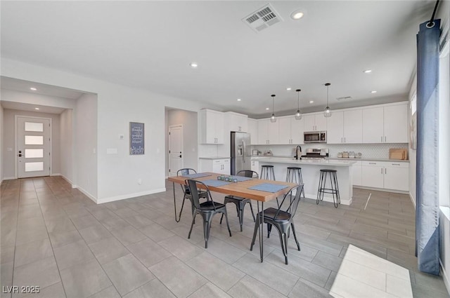 1321 Hudson Creek Pl, North Las Vegas, NV 89084 - dining area with recessed lighting and baseboards