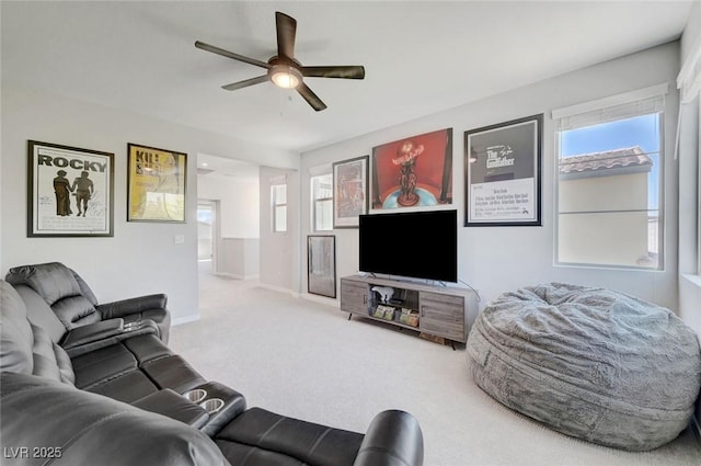 1321 Hudson Creek Pl, North Las Vegas, NV 89084 - carpeted living area with a ceiling fan, plenty of natural light, and baseboards