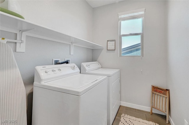 1321 Hudson Creek Pl, North Las Vegas, NV 89084 - laundry room with washer and dryer, baseboards, and light tile patterned floors