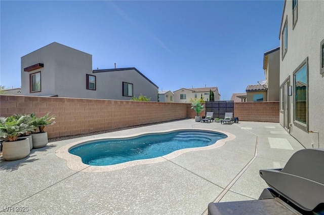 1321 Hudson Creek Pl, North Las Vegas, NV 89084 - view of swimming pool featuring a patio area and a fenced backyard