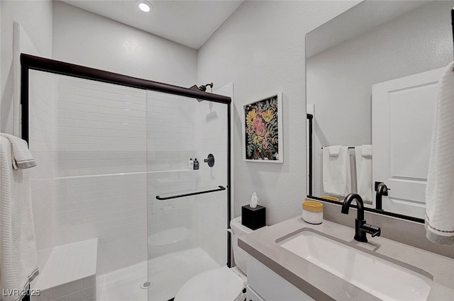1321 Hudson Creek Pl, North Las Vegas, NV 89084 - bathroom with a shower stall, vanity, and toilet