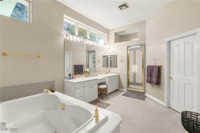 2346 Villandry Ct, Henderson, NV 89074 - bathroom with vanity, a jetted tub, baseboards, and a shower stall
