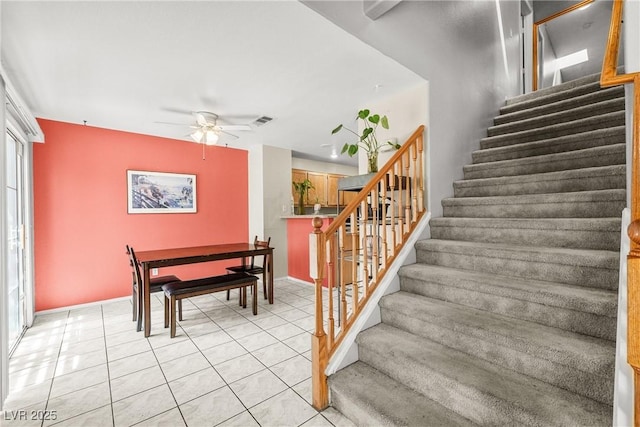 3464 Twilight Star Dr, Las Vegas, NV 89117 - stairway with ceiling fan and tile patterned floors
