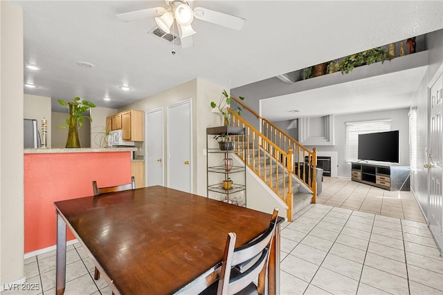 3464 Twilight Star Dr, Las Vegas, NV 89117 - dining room featuring light tile patterned flooring, stairway, a ceiling fan, and recessed lighting
